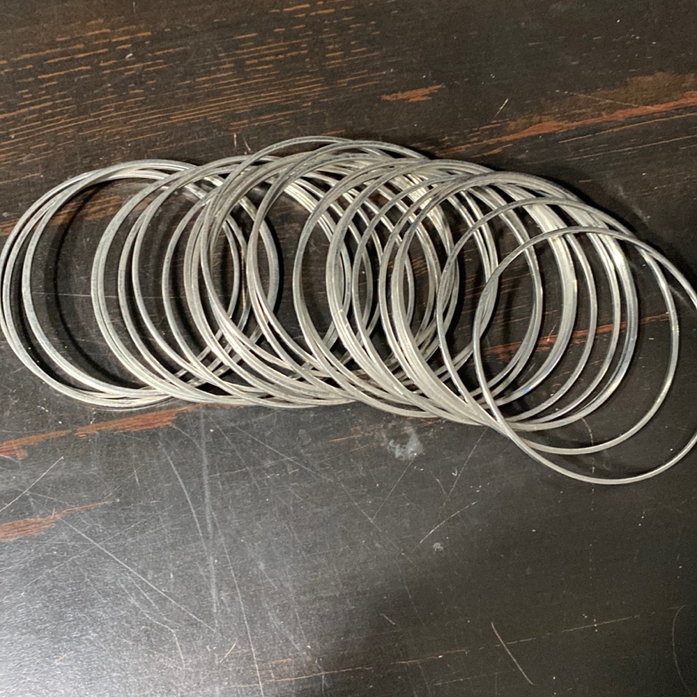 Silver bangle bracelets - 26 individual bracelets
